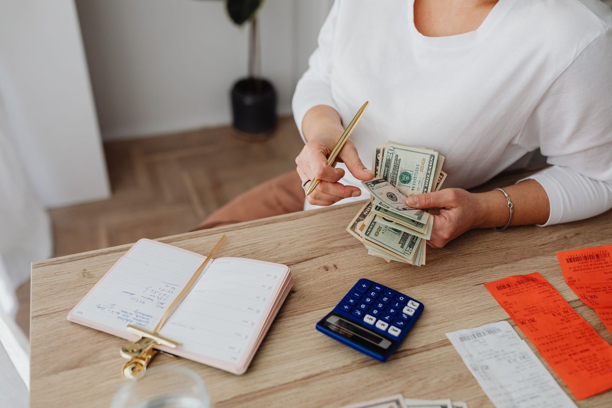 People reviewing finances with a laptop at home
